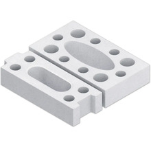 Zwei weiße Porenbetonsteine mit Aussparungen