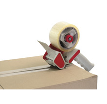 Verpackungsklebebandabroller auf einem Karton