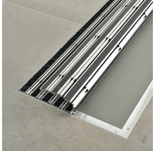 Detailansicht eines Bodeneinbaurahmens aus Aluminium mit Textilmatte für Sauberlauf