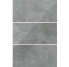 Drei graue Fliesen mit Betonoptik.