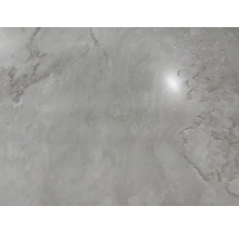 Nahaufnahme einer weißen Marmoroberfläche.