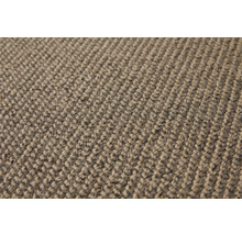 Nahaufnahme eines beigen Teppichs