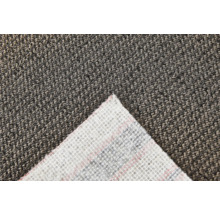 Detailaufnahme eines grauen Teppichs mit einem Ausschnitt der Unterseite