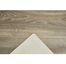 Detailansicht einer Holzfußbodenoberfläche mit einer hellen Filzunterlage