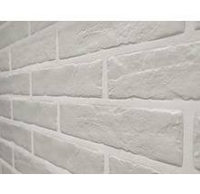 Nahaufnahme einer Wand mit Ziegelmuster für den Innenbereich.