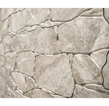 Nahaufnahme einer Wandverkleidung in Steinoptik.