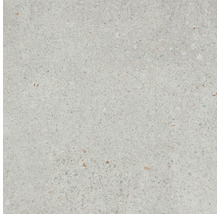 Nahaufnahme einer hellen Steinzeugfliese mit strukturierter Oberfläche