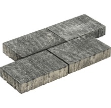 Vier graue Pflastersteine aus Beton