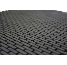 Detailansicht einer Fußmatte mit Ziegelmuster