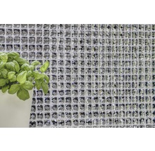 Mosaikfliesen mit Kristallglasoptik an der Wand