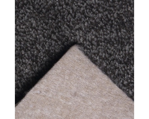 Detailansicht eines dunkelgrauen Teppichs mit Textilrücken