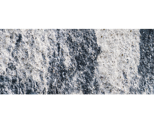 Nahaufnahme einer Betonwand mit rauer Textur