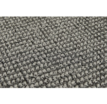 Nahaufnahme eines grauen Teppichs