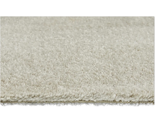 Detailansicht eines hellen Teppichs mit kurzem Flor