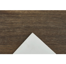 Weisse Ecke auf braunem Holzgrund