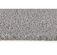 Detailaufnahme eines grauen Teppichs