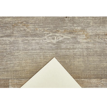 Dekorplatte mit Holzstruktur und hellem Papiereck