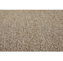 Nahaufnahme eines beigen Teppichs