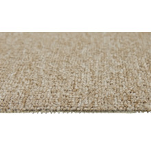 Nahaufnahme eines beigen Teppichs