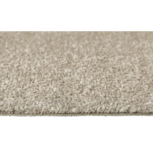 Nahaufnahme eines beigen Teppichs