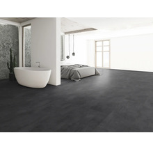 Modernes Schlafzimmer mit freistehender Badewanne und dunklem Bodenbelag