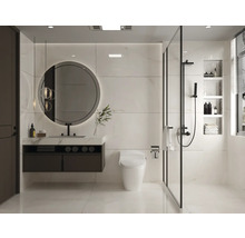 Modernes Badezimmer mit runder Spiegelwandleuchte, Waschbeckenunterschrank, Toilette und begehbarer Dusche.