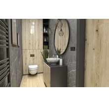 Modernes Badezimmer mit Waschtisch, Spiegel, Toilette und Heizkörper.