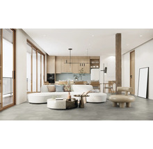 Wohnraum mit Sofa, Küchentheke und Holzelementen für modernes Wohnen