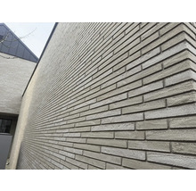 Fassade mit Mauerwerk aus Ziegelsteinen