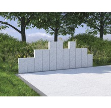 Gartenansicht mit Windschutzwand aus Stein