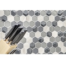 Mosaikfliese mit Sechseckmuster und Messerblock