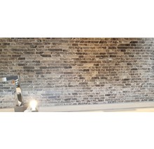 Wandgestaltung mit Steinpaneelen in Backsteinoptik