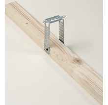 Balkenschuh aus Metall an einem Holzbrett befestigt