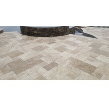 Verlegung von Natursteinplatten im Außenbereich