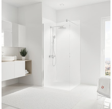 Modernes Badezimmer mit ebenerdiger Dusche, Waschtisch und weißem Teppich für ein helles, freundliches Ambiente.
