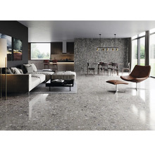 Modernes Wohnzimmer mit Sofa, Esstisch und Terrazzo-Fliesen