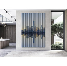 Dekoratives Wandbild mit Skyline-Motiv in einem modern eingerichteten Raum