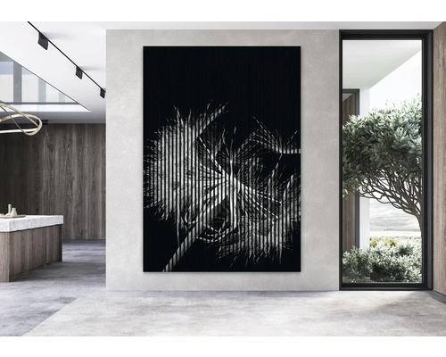 Dekoratives Wandbild mit Pflanzenmotiv im modernen Wohnraum.