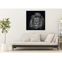 Dekoratives Wandbild mit Löwenmotiv über einem Sofa