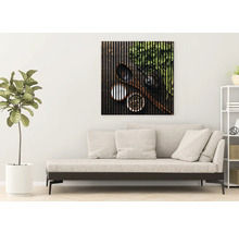 Dekoratives Wandbild mit Küchenmotiven über einer Couch