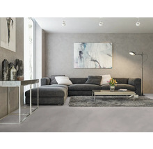 Modernes Wohnzimmer mit grauer Eckcouch, Couchtisch und Kunst an der Wand.