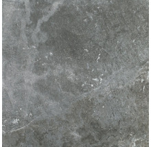 Nahaufnahme einer grauen Bodenfliese mit Betonoptik