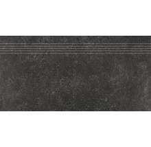Dunkle Trittstufe mit Struktur und Rillen