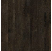 Nahaufnahme eines dunklen Holzparkettbodens.