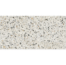 Nahaufnahme einer Terrazzo Fliese mit Steineinschlüssen