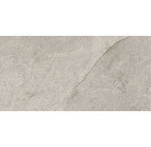 Nahaufnahme einer grauen Bodenfliese mit matter Oberfläche