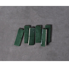 Sechs grüne Mosaikfliesen