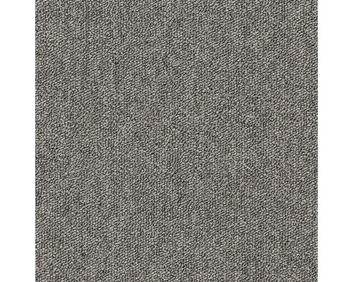 Nahaufnahme eines grauen Teppichs.