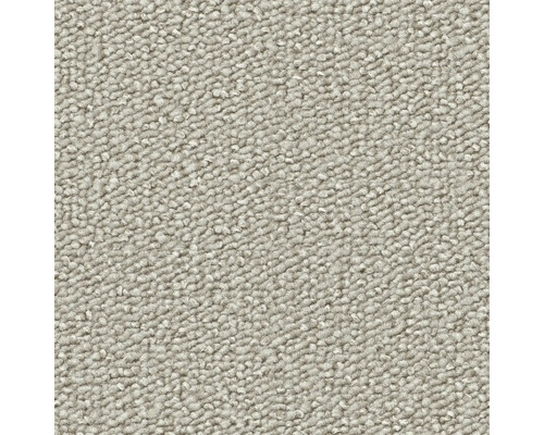 Nahaufnahme eines beigen Teppichs.