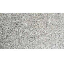 Nahaufnahme einer Granitoberfläche mit gesprenkelter Struktur.